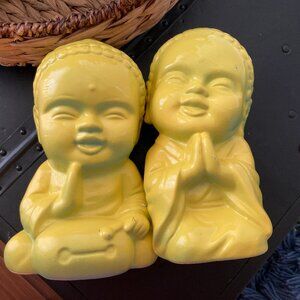 Two Yellow  Kneeling Ceramic Buddha Babies